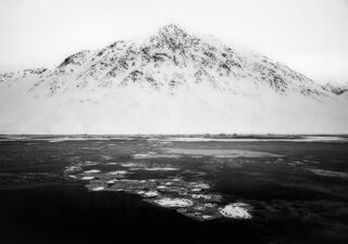 Snowing as the Mountain Looms Large